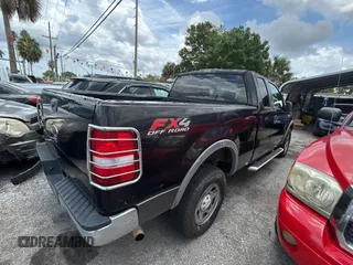 2005 Ford F-150 XLT with VIN 1FTPX14585NA13563, listed as a Copart auction lot 63709515 with 248,403 mi miles and Clean title. Bid and sale history available at DreamBid. Image 4.