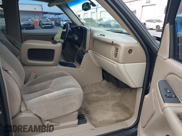 2005 Chevrolet Tahoe Z71 with VIN 1GNEC13TX5R145310, listed as a IAAI auction lot 42056793 with 159,002 mi miles and . Bid and sale history available at DreamBid. Image 5.