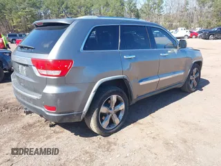 2012 Jeep Grand Cherokee Overland with VIN 1C4RJECT7CC105614, listed as a IAAI auction lot 41629174 with 264,756 mi miles. Bid and sale history available at carsss.com. Image 4.