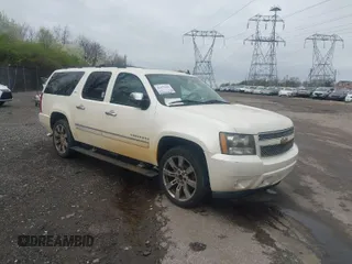 2010 Chevrolet Suburban LTZ with VIN 1GNUKKE35AR129351, listed as a IAAI auction lot 41971625 with 234,487 mi miles. Bid and sale history available at carsss.com. Image 1.