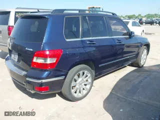 2012 Mercedes-Benz GLK-Class GLK 350 with VIN WDCGG8HB9CF885891, listed as a IAAI auction lot 42007117 with 153,562 mi miles. Bid and sale history available at carsss.com. Image 4.