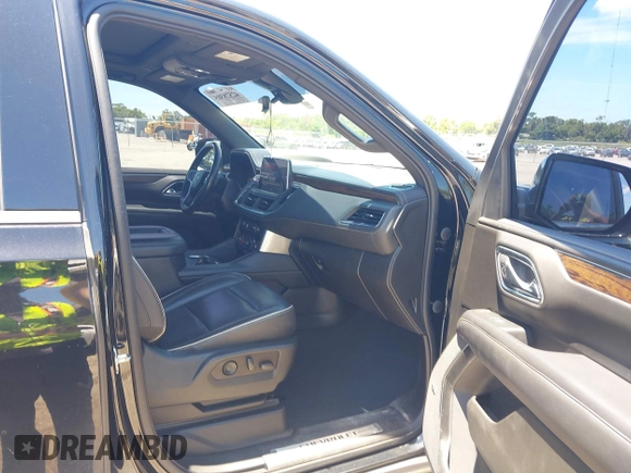 2021 Chevrolet Tahoe Premier with VIN 1GNSKSKDXMR195984, listed as a IAAI auction lot 42528305 with 89,925 mi miles and . Bid and sale history available at DreamBid. Image 5.