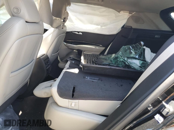 2021 Cadillac XT4 FWD Premium Luxury с VIN 1GYFZCR4XMF004996, выставлен на аукционе Copart как лот 61270355 с пробегом Не указан миль и Списание • Salvage title. История ставок и продаж доступна на DreamBid. Изображение 11.