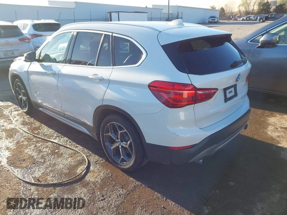 2016 BMW X1 xDrive28i with VIN WBXHT3C37GP888249, listed as a IAAI auction lot 41794102 with 116,175 mi miles and . Bid and sale history available at DreamBid. Image 3.