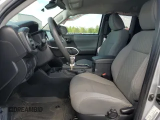 2023 Toyota Tacoma SR with VIN 3TYSX5ENXPT018099, listed as a Copart auction lot 52520145 with 15,640 mi miles and Salvage title. Bid and sale history available at DreamBid. Image 7.
