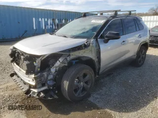 2021 Toyota RAV4 Hybrid XSE with VIN 4T3E6RFV1MU057403, listed as a Copart auction lot 47809415 with 56,570 mi miles and Salvage Title. Bid and sale history available at carsss.com. Image 1.