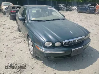 2004 Jaguar X-Type with VIN SAJEA51C64WE17722, listed as a Copart auction lot 55416405 with 89,047 mi miles and Salvage Title. Bid and sale history available at DreamBid. Image 13.
