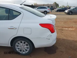 2014 Nissan Versa S Plus with VIN 3N1CN7AP1EL843379, listed as a IAAI auction lot 41905567 with 125,293 mi miles. Bid and sale history available at carsss.com. Image 6.