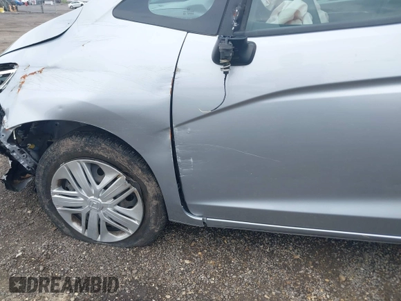 2019 Honda Fit LX z VIN 3HGGK5H45KM725916, wystawiony jako IAAI lot #42654907 z przebiegiem 92 580 mil mil oraz . Historia ofert i sprzedaży dostępna na DreamBid. Obrazek 19.