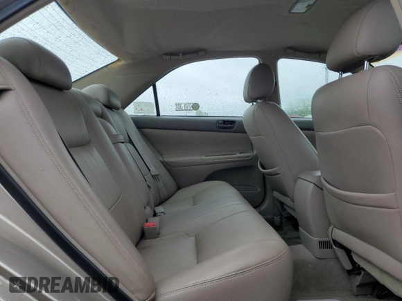 2002 Toyota Camry LE z VIN 4T1BE32K42U623283, wystawiony jako Copart lot #55631065 z przebiegiem 96 830 mil mil oraz Szkoda całkowita • Salvage title. Historia ofert i sprzedaży dostępna na DreamBid. Obrazek 10.