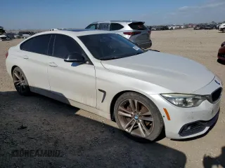 2015 BMW 4 Series 428i with VIN WBA4A5C5XFD410290, listed as a Copart auction lot 49067335 with 165,283 mi miles and Clean Title. Bid and sale history available at DreamBid. Image 4.
