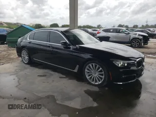 2017 BMW 7 Series 740i with VIN WBA7E2C31HG741176, listed as a Copart auction lot 65698233 with 27,332 mi miles. Bid and sale history available at carsss.com. Image 4.