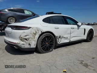 2021 Porsche Panamera с VIN WP0AJ2A77ML118432, выставлен на аукционе Copart как лот 58074245 с пробегом 30 162 миль миль и Списание • Salvage title. История ставок и продаж доступна на DreamBid. Изображение 3.