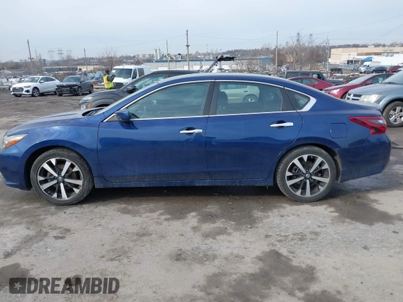 2018 Nissan Altima 2.5 SR with VIN 1N4AL3AP3JC101421, listed as a IAAI auction lot 41482620 with 101,431 mi miles. Bid and sale history available at carsss.com. Image 14.