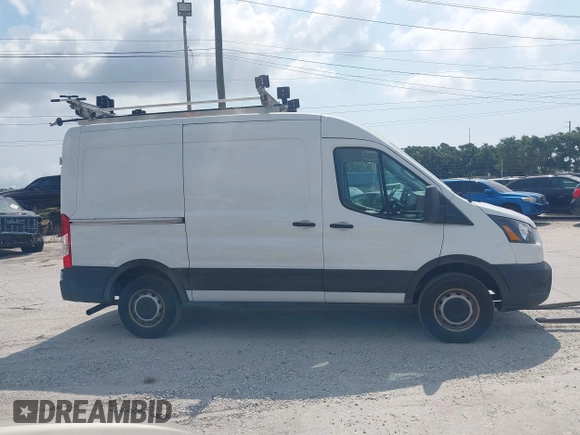2020 Ford Transit Cargo with VIN 1FTBR1C88LKB38805, listed as a IAAI auction lot 42197348 with 93,779 mi miles and . Bid and sale history available at DreamBid. Image 13.