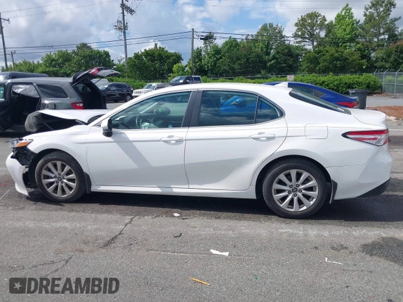 2019 Toyota Camry LE z VIN 4T1B11HKXKU237605, wystawiony jako IAAI lot #42248386 z przebiegiem 70 235 mil mil oraz . Historia ofert i sprzedaży dostępna na DreamBid. Obrazek 14.