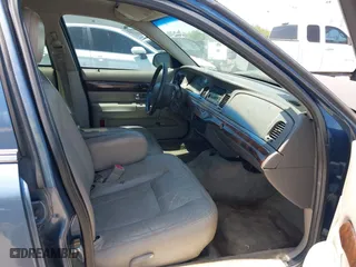 2009 Mercury Grand Marquis LS with VIN 2MEHM75V09X634393, listed as a IAAI auction lot 41993456 with 153,862 mi miles. Bid and sale history available at carsss.com. Image 5.