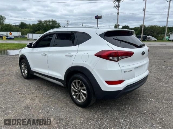 2018 Hyundai Tucson SEL z VIN KM8J33A40JU676727, wystawiony jako Copart lot #87532055 z przebiegiem 128 554 mil mil oraz Czysty tytuł • Clean title. Historia ofert i sprzedaży dostępna na DreamBid. Obrazek 3.