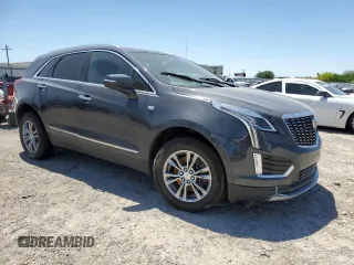 2023 Cadillac XT5 FWD Premium Luxury z VIN 1GYKNCRS0PZ173923, wystawiony jako Copart lot #52212695 z przebiegiem Nie podano mil oraz Szkoda całkowita • Salvage title. Historia ofert i sprzedaży dostępna na DreamBid. Obrazek 4.