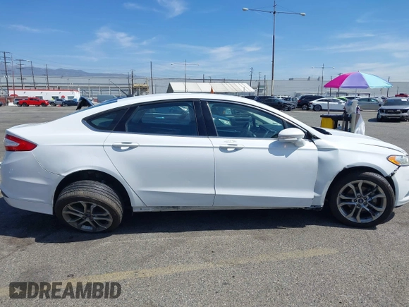 2016 Ford Fusion SE with VIN 3FA6P0H75GR284362, listed as a IAAI auction lot 42067568 with 132,557 mi miles and . Bid and sale history available at DreamBid. Image 6.
