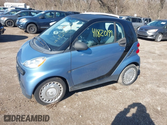 2013 Smart fortwo Pure z VIN WMEEJ3BA5DK672416, wystawiony jako IAAI lot #41820199 z przebiegiem 75 875 mil mil oraz . Historia ofert i sprzedaży dostępna na DreamBid. Obrazek 2.