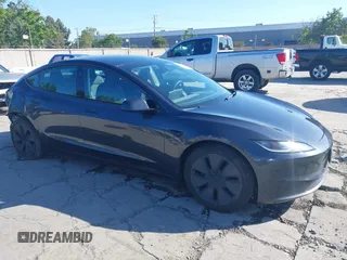 2024 Tesla Model 3 Long Range z VIN 5YJ3E1EB2RF740291, wystawiony jako IAAI lot #42124138 z przebiegiem 36 452 mil mil oraz . Historia ofert i sprzedaży dostępna na DreamBid. Obrazek 1.