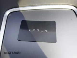 2022 Tesla Model Y Performance with VIN 7SAYGDEF7NF497076, listed as a IAAI auction lot 41759793 with 46,970 mi miles and . Bid and sale history available at DreamBid. Image 11.