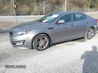 2013 Kia Optima SX with VIN 5XXGR4A68DG172070, listed as a IAAI auction lot 40820289 with 147,124 mi miles and . Bid and sale history available at DreamBid. Image 2.