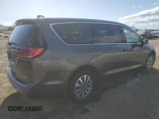 2023 Chrysler Pacifica Hybrid Touring L with VIN 2C4RC1L79PR608659, listed as a Copart auction lot 56945365 with 45,697 mi miles and Salvage title. Bid and sale history available at DreamBid. Image 3.