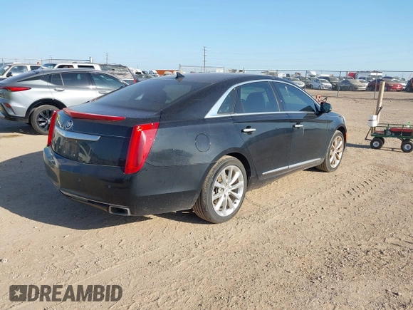 2014 Cadillac XTS Luxury with VIN 2G61M5S35E9228802, listed as a IAAI auction lot 42542501 with 106,506 mi miles and . Bid and sale history available at DreamBid. Image 4.