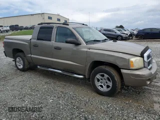 2006 Dodge Dakota SLT with VIN 1D7HE48N66S641149, listed as a Copart auction lot 58823615 with 169,002 mi miles and Salvage title. Bid and sale history available at DreamBid. Image 4.