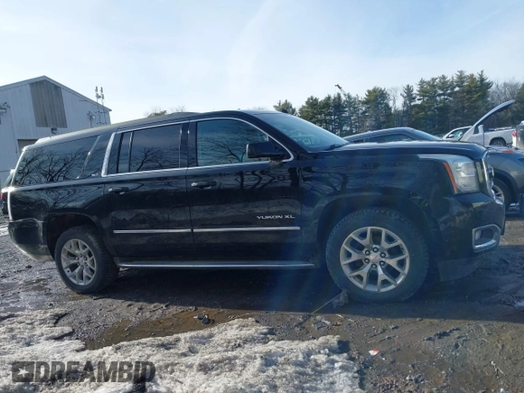 2015 GMC Yukon XL SLT with VIN 1GKS2HKC9FR159164, listed as a IAAI auction lot 41708822 with 136,730 mi miles. Bid and sale history available at carsss.com. Image 13.