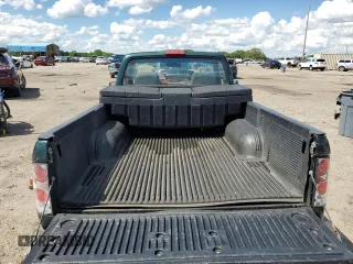 1999 Toyota Tacoma z VIN 4TANL42N5XZ453478, wystawiony jako Copart lot #56711635 z przebiegiem 197 412 mil mil oraz Szkoda całkowita • Salvage title. Historia ofert i sprzedaży dostępna na DreamBid. Obrazek 10.