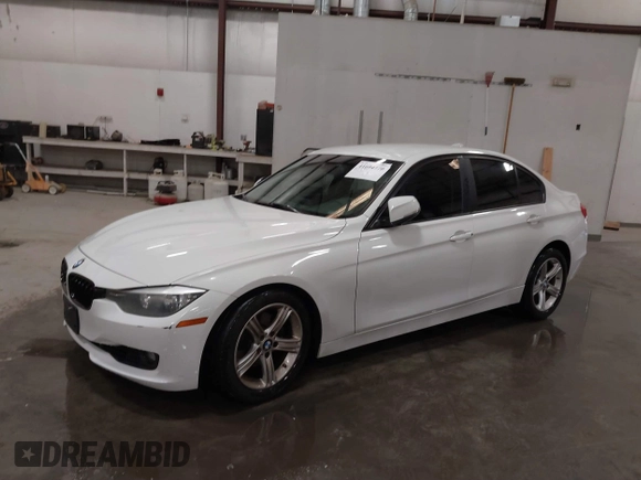 2014 BMW 3 Series 328i with VIN WBA3C1C52EK112194, listed as a IAAI auction lot 41694770 with 139,609 mi miles. Bid and sale history available at carsss.com. Image 2.