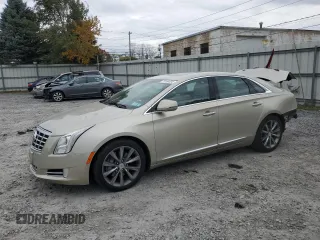2013 Cadillac XTS Luxury z VIN 2G61R5S35D9177074, wystawiony jako Copart lot #79166404 z przebiegiem 84 231 mil mil oraz Nie do naprawy • Non repairable. Historia ofert i sprzedaży dostępna na DreamBid. Obrazek 1.