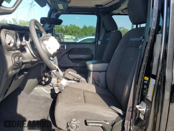 2023 Jeep Wrangler Rubicon z VIN 1C4JJXR62PW663711, wystawiony jako Copart lot #54816255 z przebiegiem 29 123 mil mil oraz Szkoda całkowita • Salvage title. Historia ofert i sprzedaży dostępna na DreamBid. Obrazek 7.