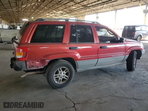2002 Jeep Grand Cherokee with VIN 1J4GX38S52C166298, listed as a Copart auction lot 80655884 with 212,113 mi miles and Salvage title. Bid and sale history available at DreamBid. Image 3.