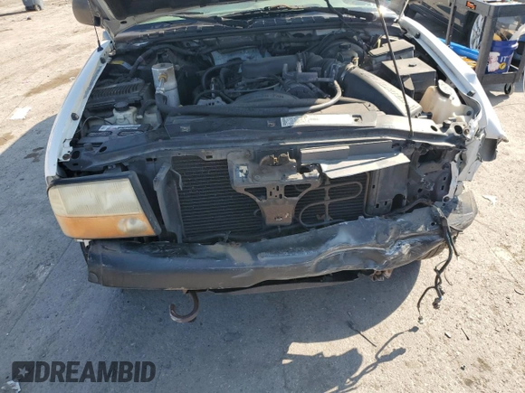 2000 GMC Jimmy SLE Convenience z VIN 1GKDT13W5Y2200634, wystawiony jako Copart lot #69860014 z przebiegiem 172 179 mil mil oraz Szkody całkowita. Historia ofert i sprzedaży dostępna na DreamBid. Obrazek 11.