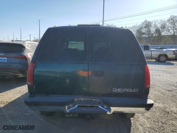 1997 Chevrolet Tahoe with VIN 1GNEK13R8VJ345656, listed as a Copart auction lot 48141495 with 250,273 mi miles and Salvage Title. Bid and sale history available at carsss.com. Image 6.