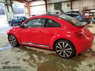 2012 Volkswagen Beetle 2.0T Turbo with VIN 3VW467AT7CM649844, listed as a Copart auction lot 44510205 with 140,411 mi miles and Salvage Title. Bid and sale history available at carsss.com. Image 2.
