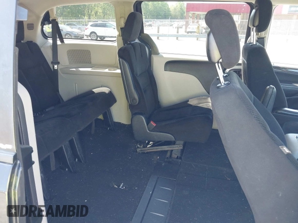 2014 Dodge Grand Caravan SXT with VIN 2C4RDGCG4ER341699, listed as a IAAI auction lot 42064523 with 234,422 mi miles and . Bid and sale history available at DreamBid. Image 8.