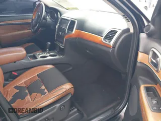 2012 Jeep Grand Cherokee Overland with VIN 1C4RJECT4CC299549, listed as a IAAI auction lot 41917306 with 229,256 mi miles. Bid and sale history available at carsss.com. Image 5.