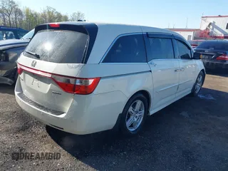 2012 Honda Odyssey Touring with VIN 5FNRL5H93CB146753, listed as a IAAI auction lot 41984850 with 155,309 mi miles and . Bid and sale history available at DreamBid. Image 4.