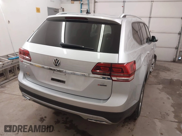2019 Volkswagen Atlas SE with VIN 1V2LR2CA2KC533079, listed as a IAAI auction lot 41352399 with 88,826 mi miles and . Bid and sale history available at DreamBid. Image 4.