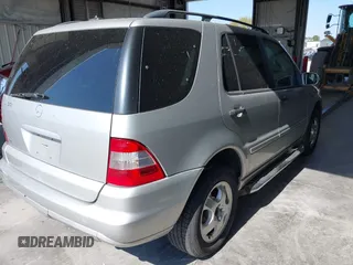 2002 Mercedes-Benz M-Class with VIN 4JGAB54E32A360356, listed as a IAAI auction lot 40540769 with 235,810 mi miles. Bid and sale history available at carsss.com. Image 4.