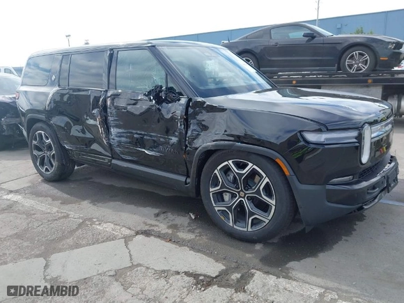 2025 Rivian R1S Adventure with VIN 7PDSGBBA5SN055497, listed as a IAAI auction lot 41695600 with 5,387 mi miles. Bid and sale history available at carsss.com. Image 1.