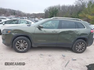 2019 Jeep Cherokee Latitude Plus with VIN 1C4PJMLB2KD395617, listed as a IAAI auction lot 41992532 with 254,632 mi miles and . Bid and sale history available at carsss.com. Image 14.
