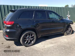 2019 Jeep Grand Cherokee Limited with VIN 1C4RJFBGXKC843402, listed as a Copart auction lot 57148265 with 96,615 mi miles and Salvage title. Bid and sale history available at DreamBid. Image 3.
