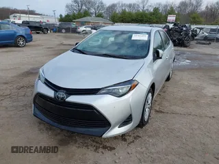 2019 Toyota Corolla L with VIN 5YFBURHE2KP934042, listed as a IAAI auction lot 41963491 with 87,299 mi miles. Bid and sale history available at carsss.com. Image 2.