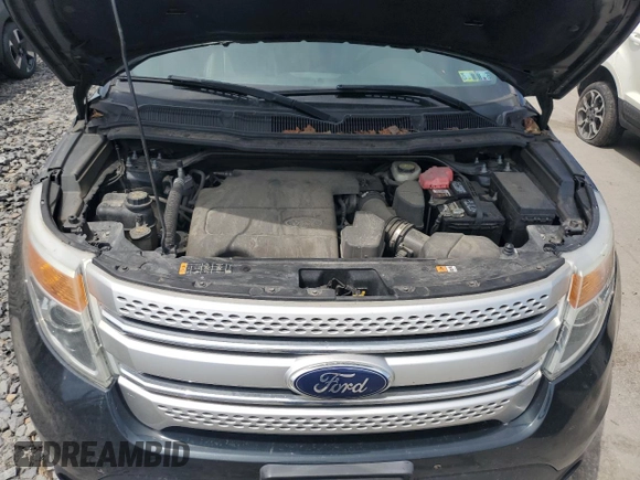 2014 Ford Explorer XLT z VIN 1FM5K8D86EGB31751, wystawiony jako Copart lot #56300825 z przebiegiem 156 764 mil mil oraz Szkody całkowita. Historia ofert i sprzedaży dostępna na DreamBid. Obrazek 12.